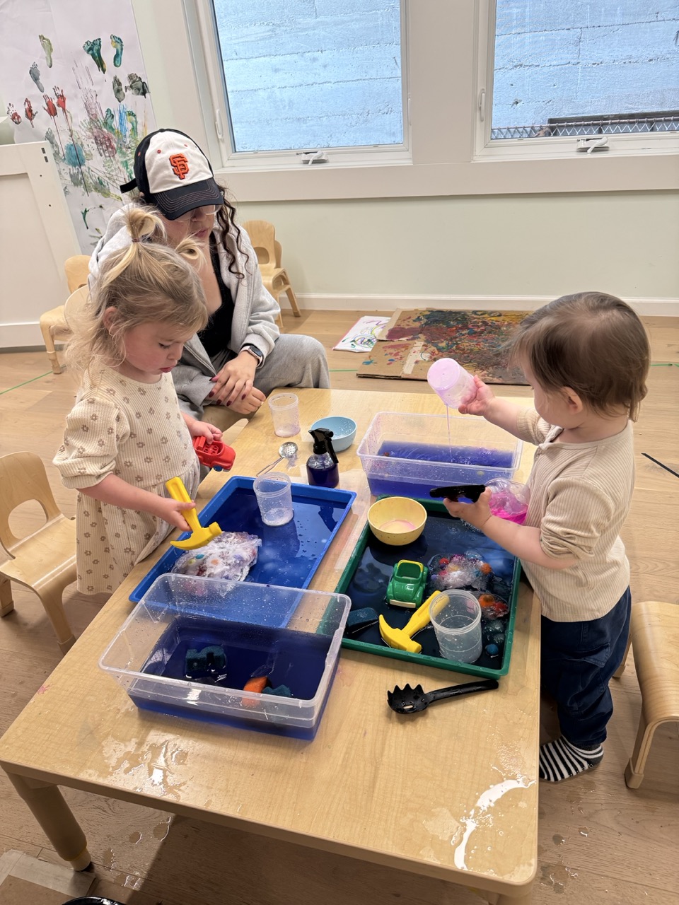 Children enjoying story time at Wonder Years preschool in Richmond District